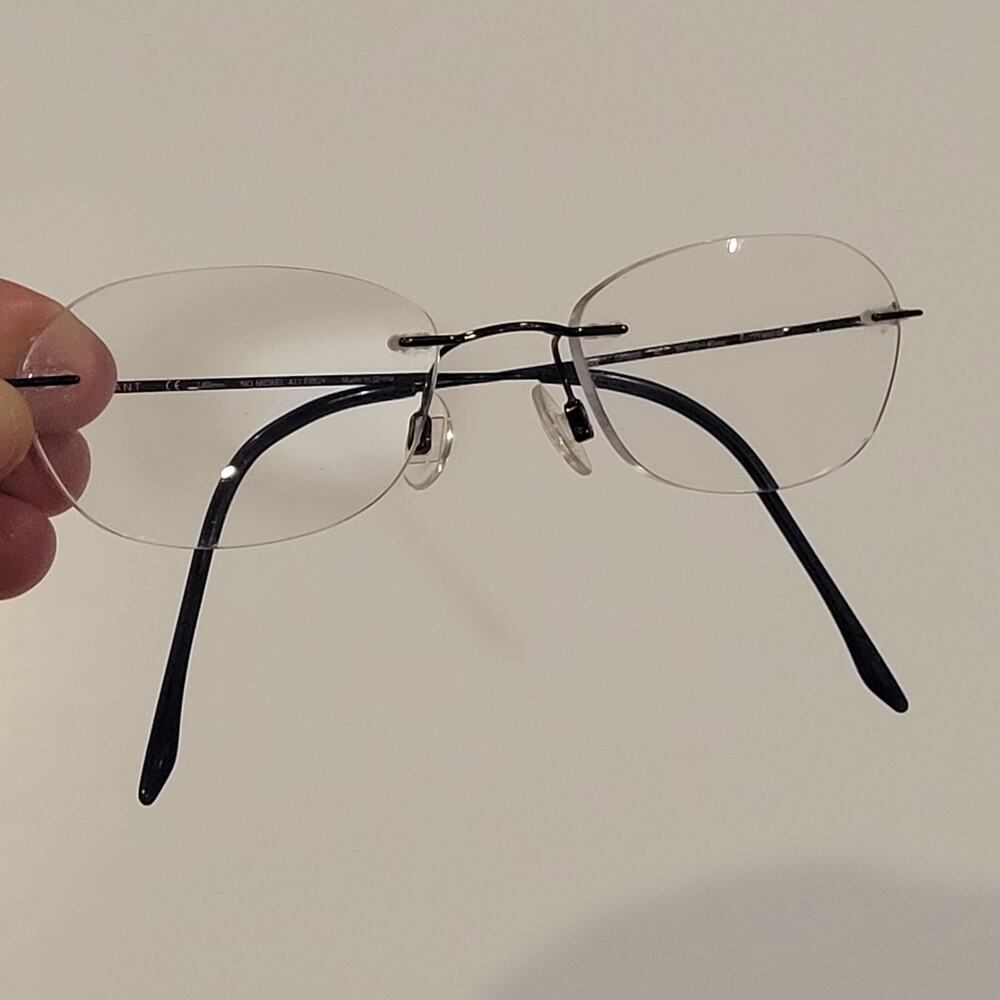 CHARMANT CH8600E BL Titanium Womens Rimless Eyeglasses 99-19-140